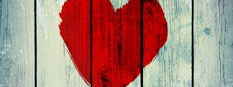 love symbol on old wooden wall